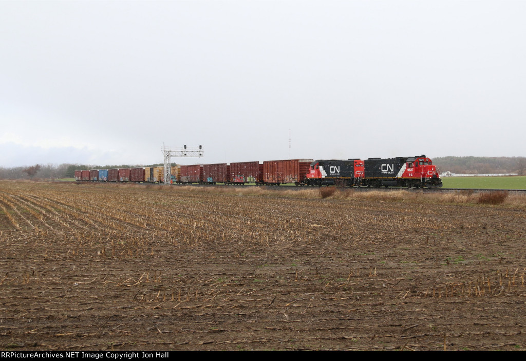 Two GP's and 13 boxcars head south on to the single track